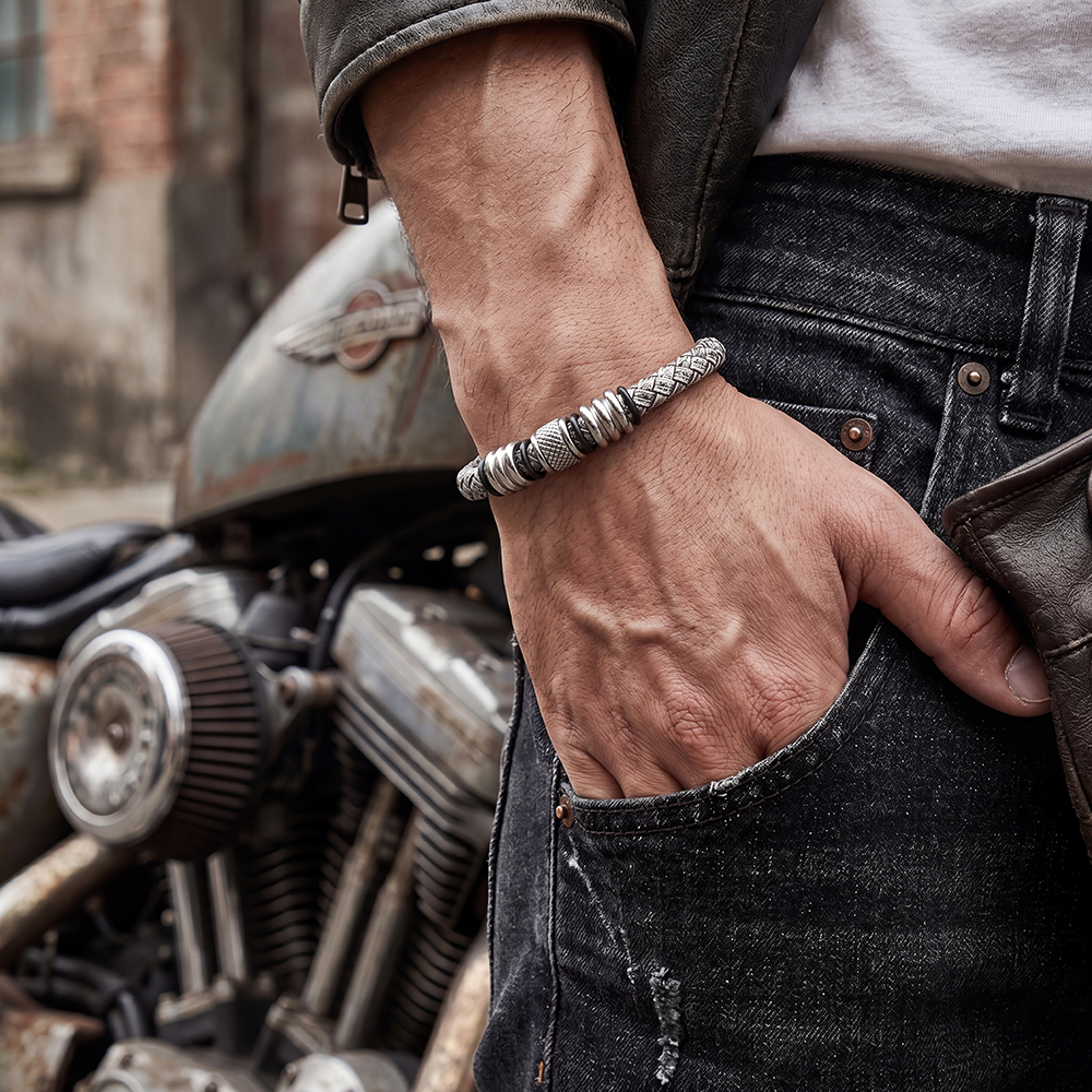  Stainless steel bracelet with PU strap – classic plaited design