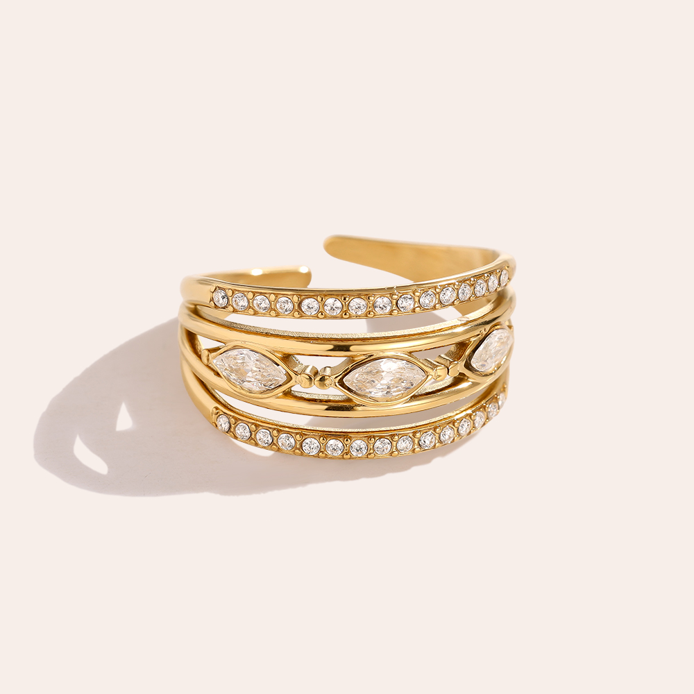 Stainless steel ring, adjustable, three-layered, with some cubic zirconia 