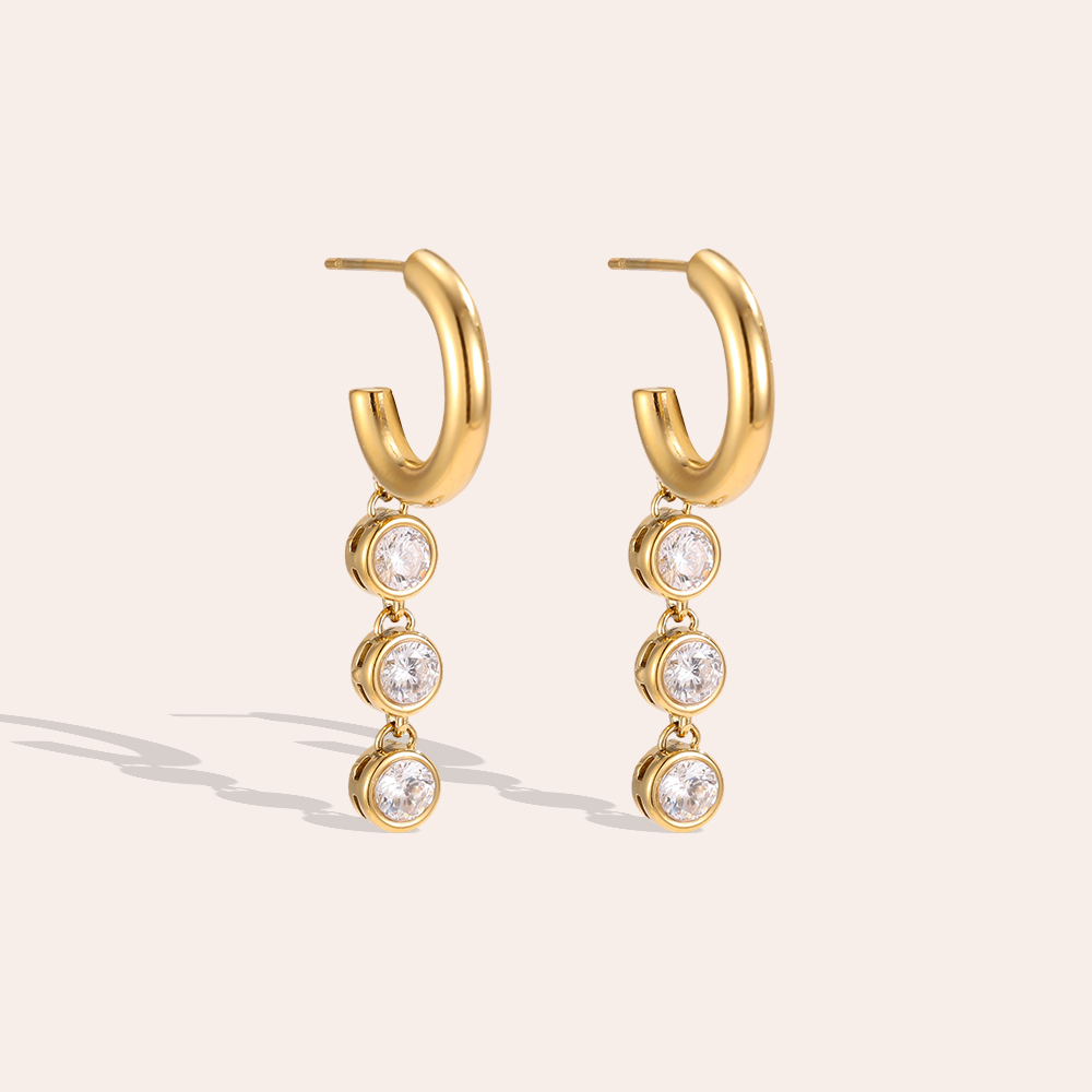Stainless steel earrings, 40 × 6 mm, with 3 round rhinestones 