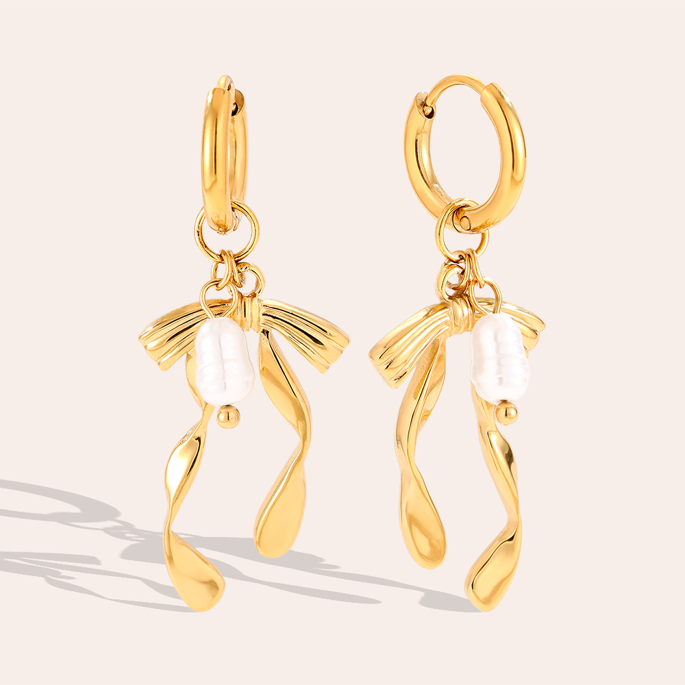 Stainless steel earrings 1.2*3.8cm Bowtie And Pearl