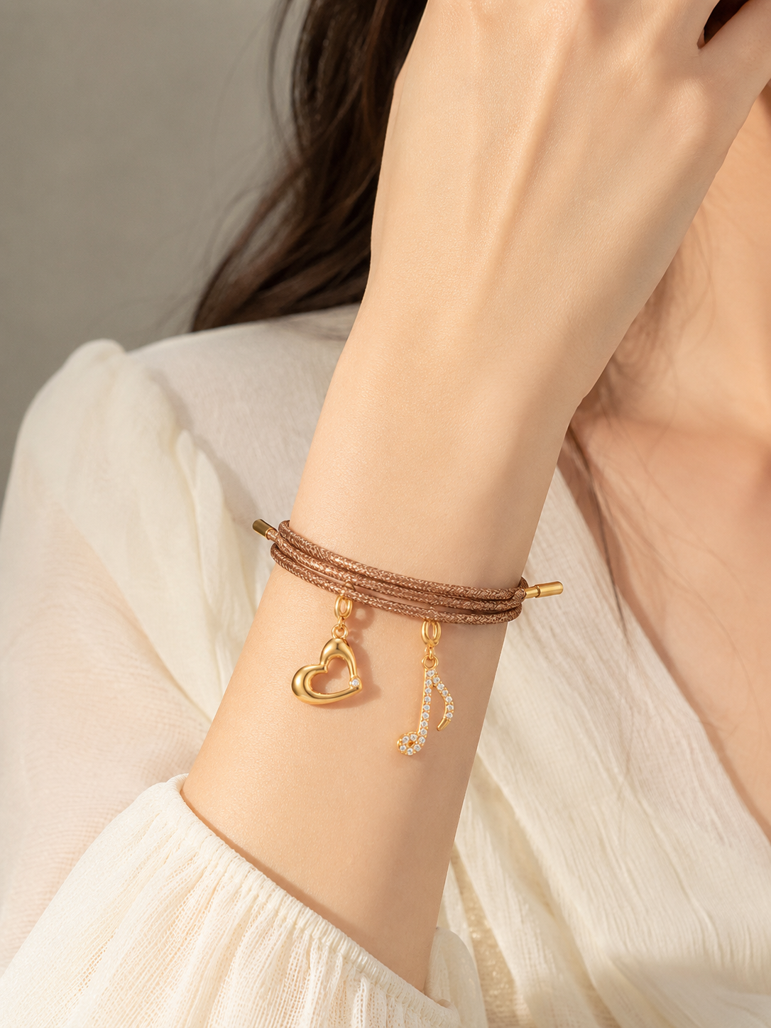 Stainless steel bracelet with multiple wearing options; elasticated polyester