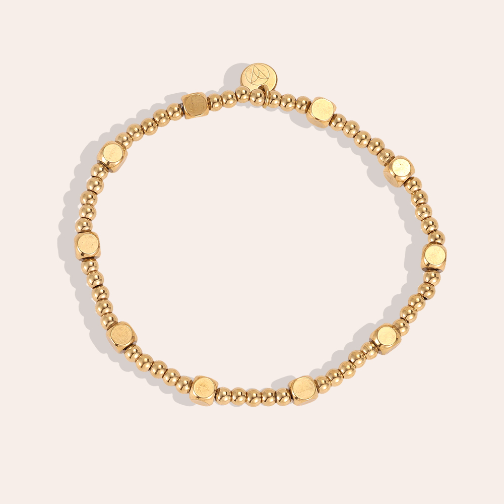 Stainless steel bracelet with elastic beads and cubes