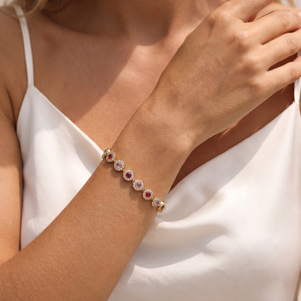 Stainless steel bracelet, 17 cm, in shades of pink, with round, sparkling zirconia stones     