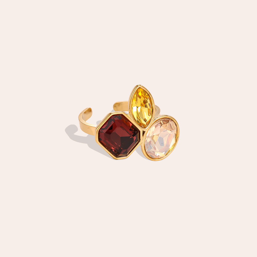 Stainless steel ring, adjustable, with three glass stones in different colours  