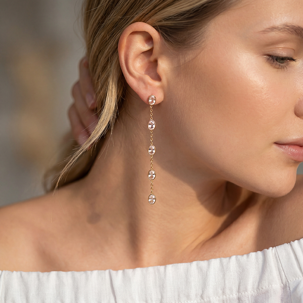 Stainless steel earrings, 7.4 × 5 mm, with lots of oval-shaped rhinestones