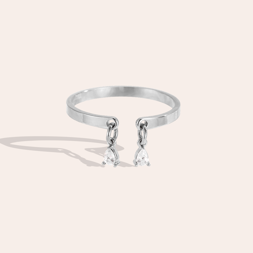 Stainless steel ring, adjustable, with two small teardrop-shaped zirconia stones