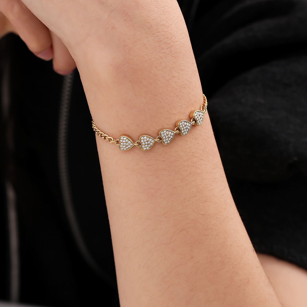 Stainless steel bracelet, 16 cm, with 5 zirconia hearts