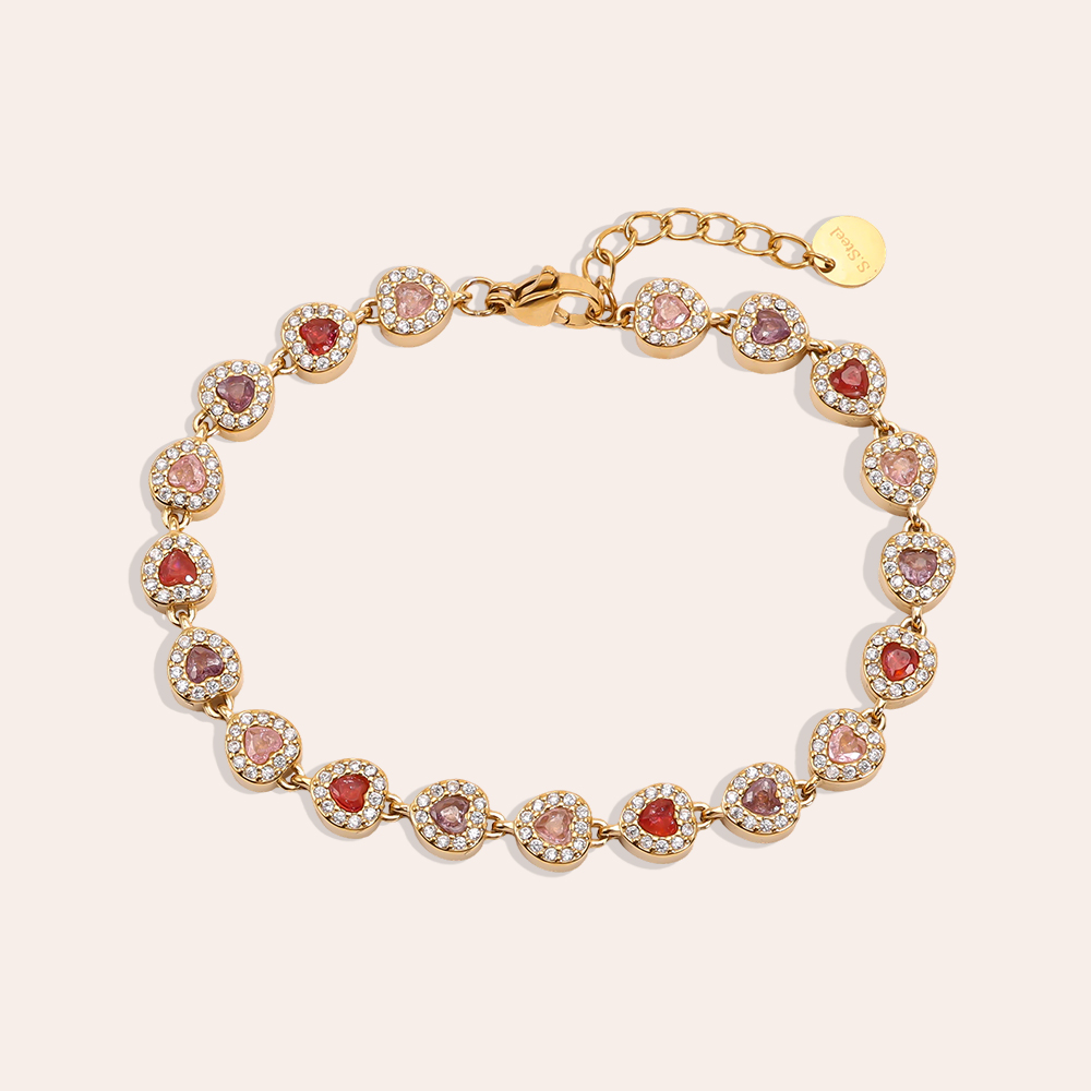 Stainless steel bracelet, 17 cm, in shades of pink, with round, sparkling zirconia stones     