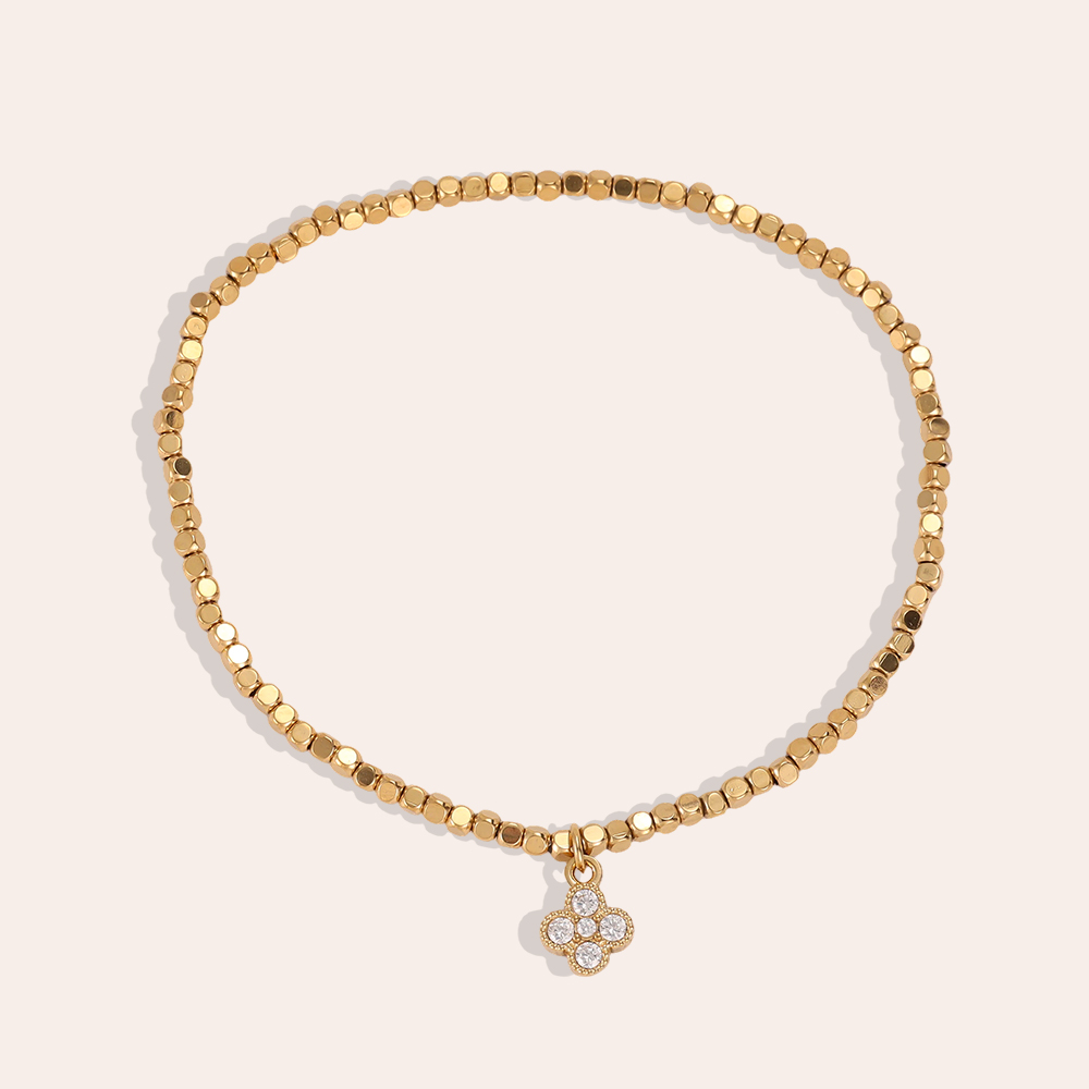 Stainless steel elastic bracelet with small square zirconia cloverleaf