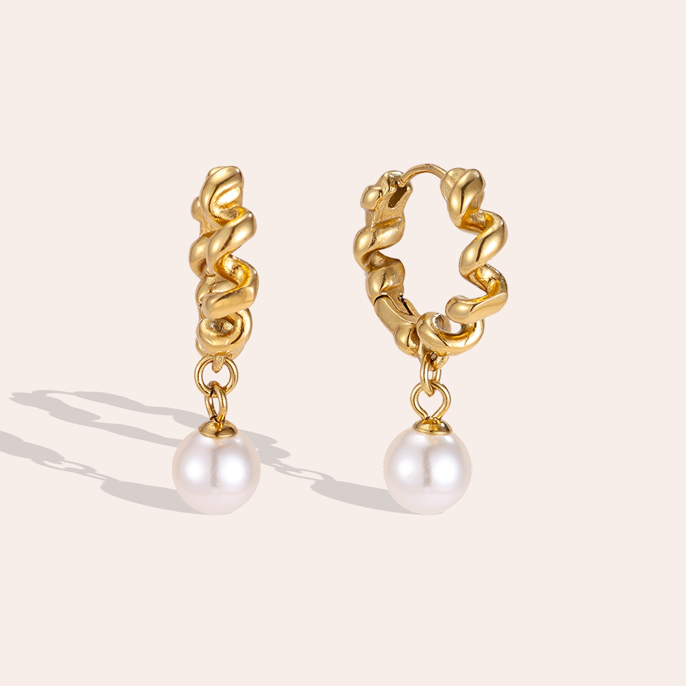 Stainless steel earrings, 29 mm. Beautiful twisted hoop earrings with a pearl