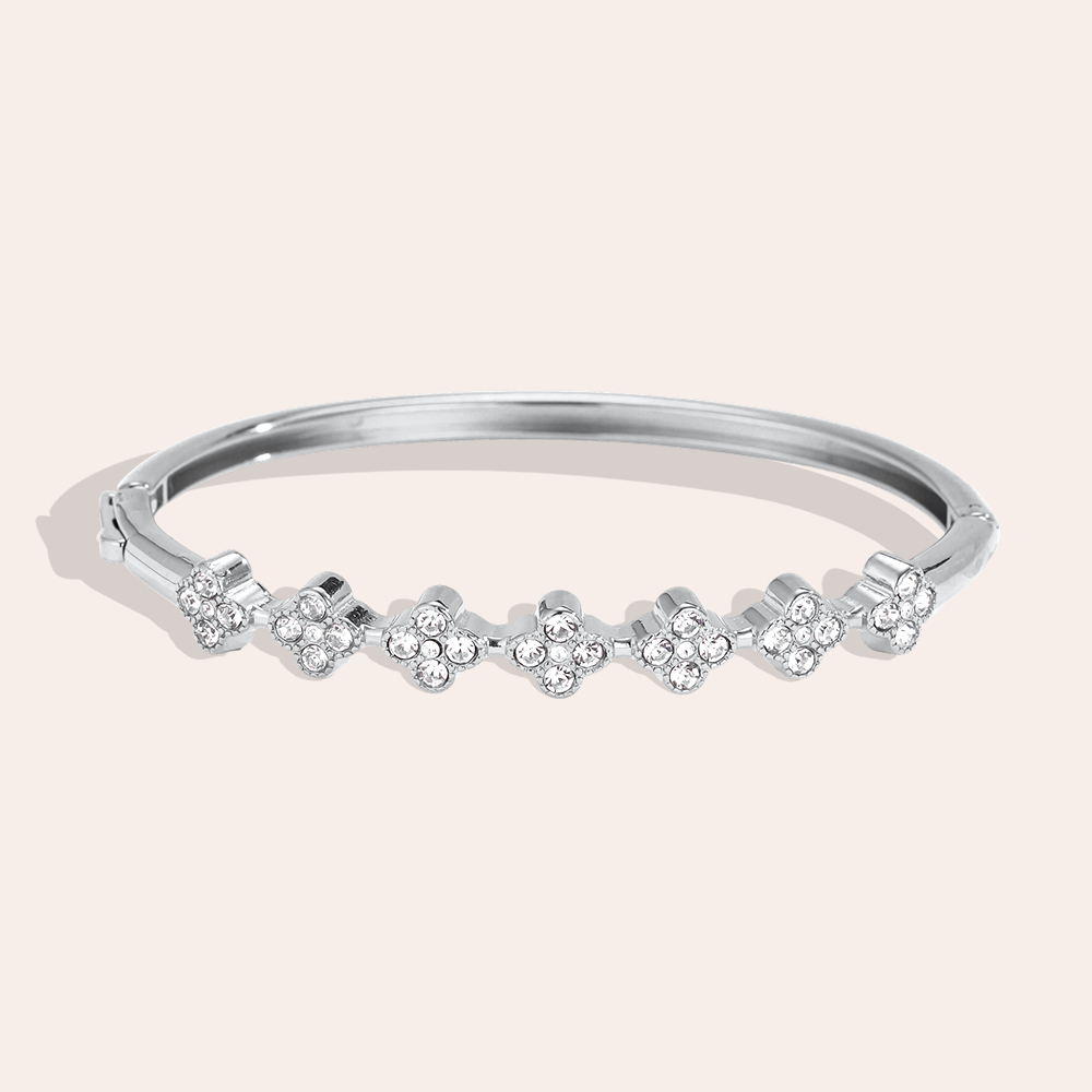 Stainless steel bangle, 6 cm, with lots of cubic zirconia in a cloverleaf design   