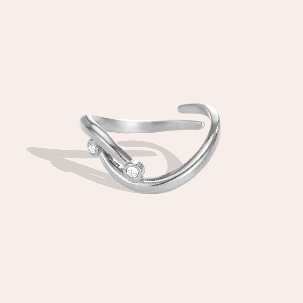 Stainless steel ring with adjustable, curved lines and cubic zirconia