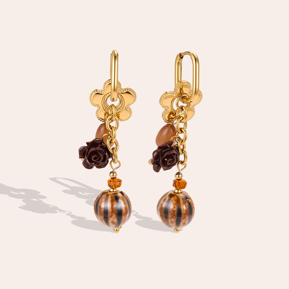 Stainless steel earrings, 54 x 13 mm, gold flower with brown decoration