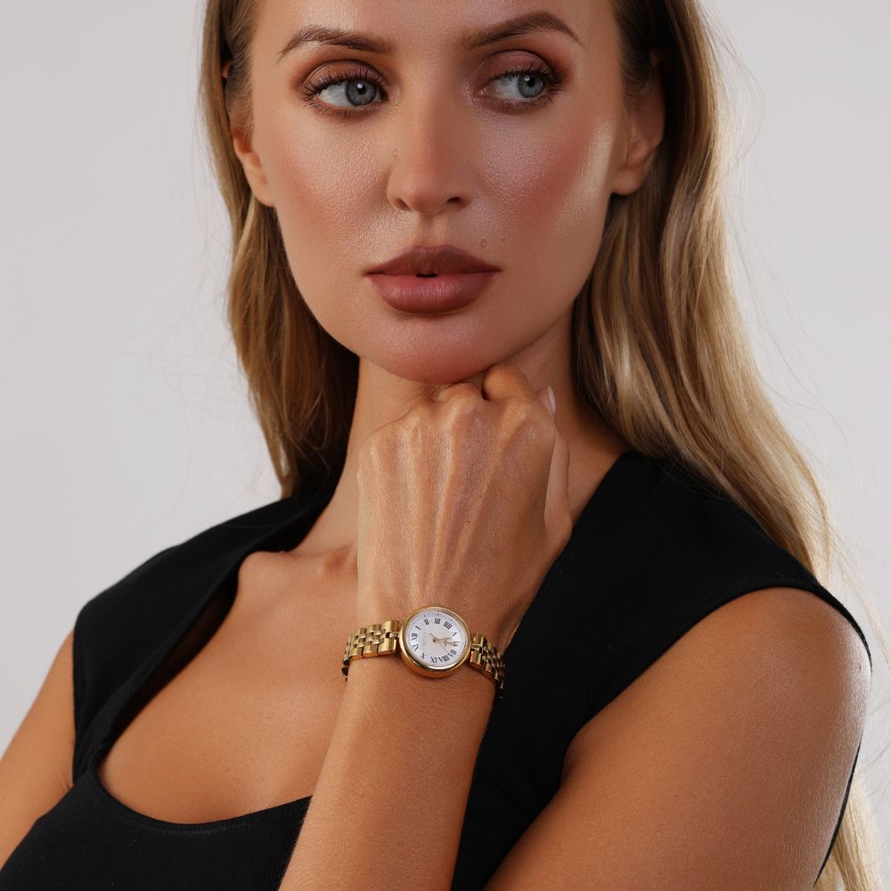 Round stainless steel watch with mother-of-pearl dial