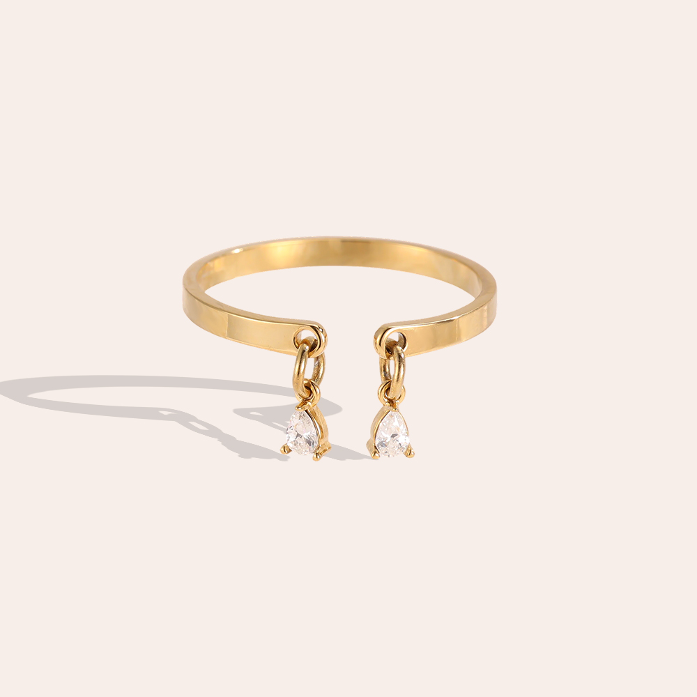 Stainless steel ring, adjustable, with two small teardrop-shaped zirconia stones
