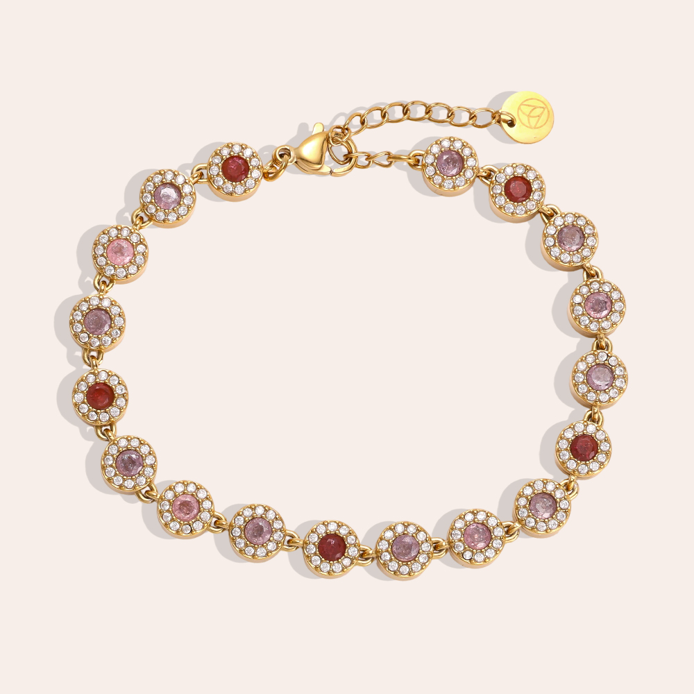 Stainless steel bracelet, 17 cm, in shades of pink, with round, sparkling zirconia stones     