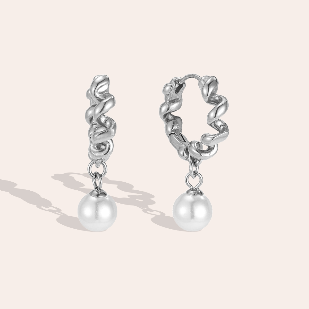 Stainless steel earrings, 29 mm. Beautiful twisted hoop earrings with a pearl