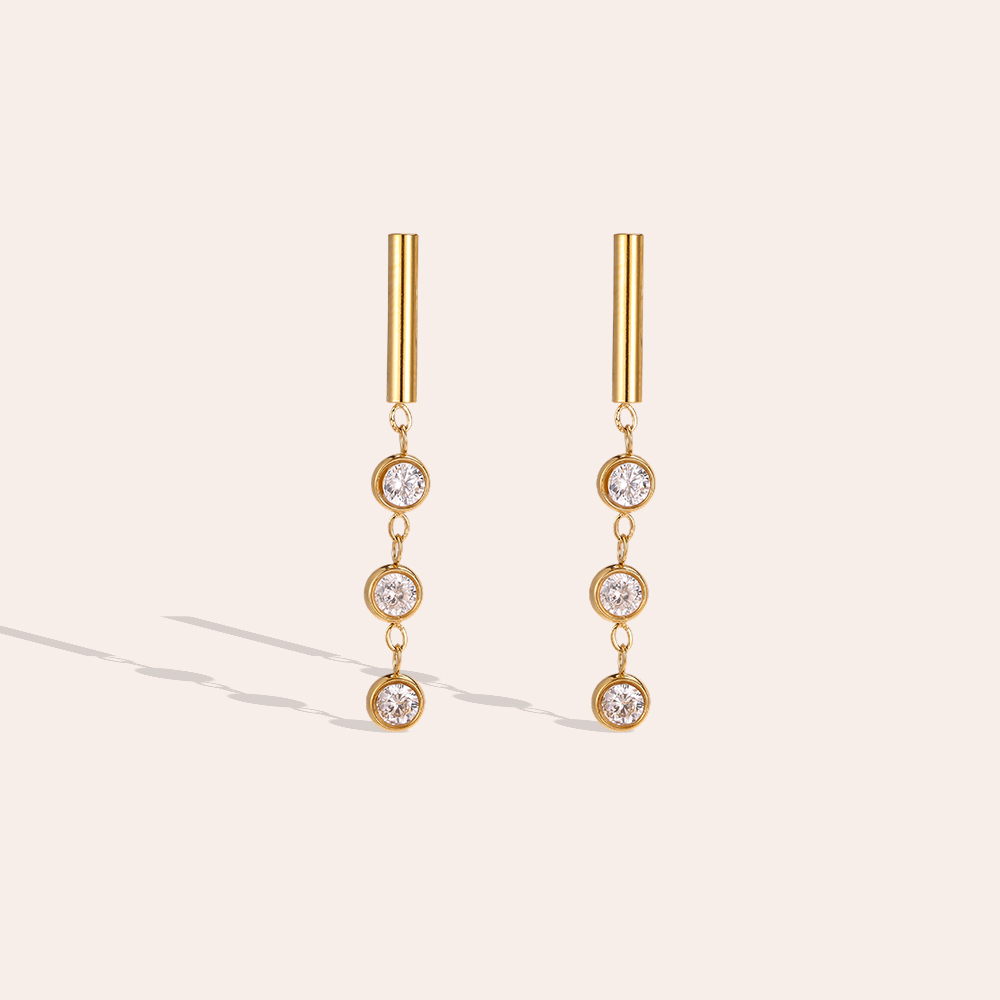 Stainless steel earrings, 32×4 mm, three round cubic zirconia stones