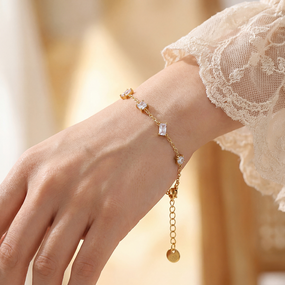 Stainless steel bracelet, 16 cm, featuring a variety of cubic zirconia stones