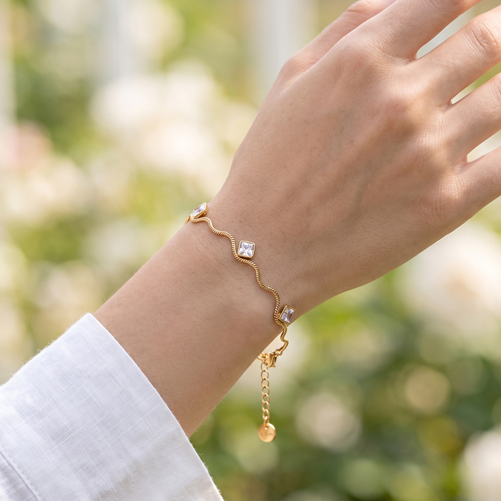 Stainless steel bracelet, 17 cm, wave chain with cube-cut zirconia