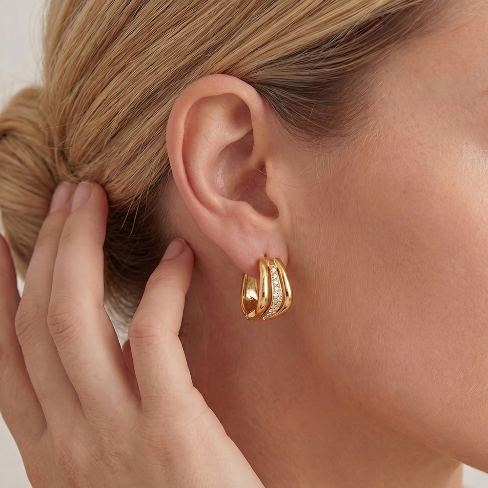 Stainless steel earrings, 15mm, wavy design, cubic zirconia  