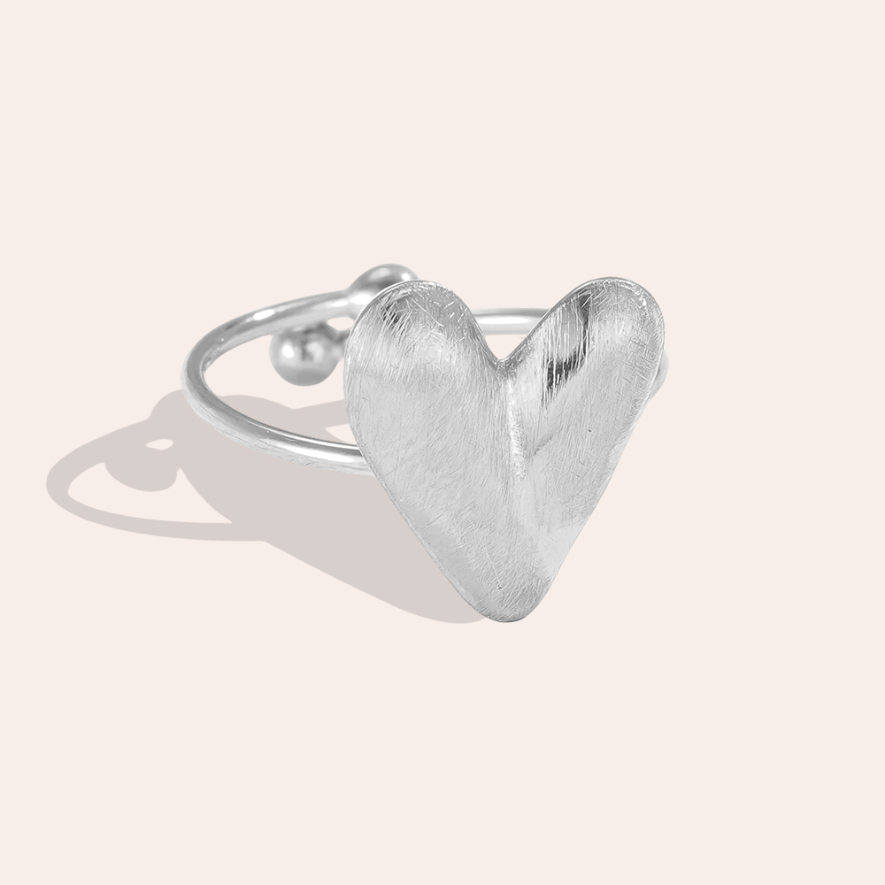 Stainless steel ring with adjustable matt heart