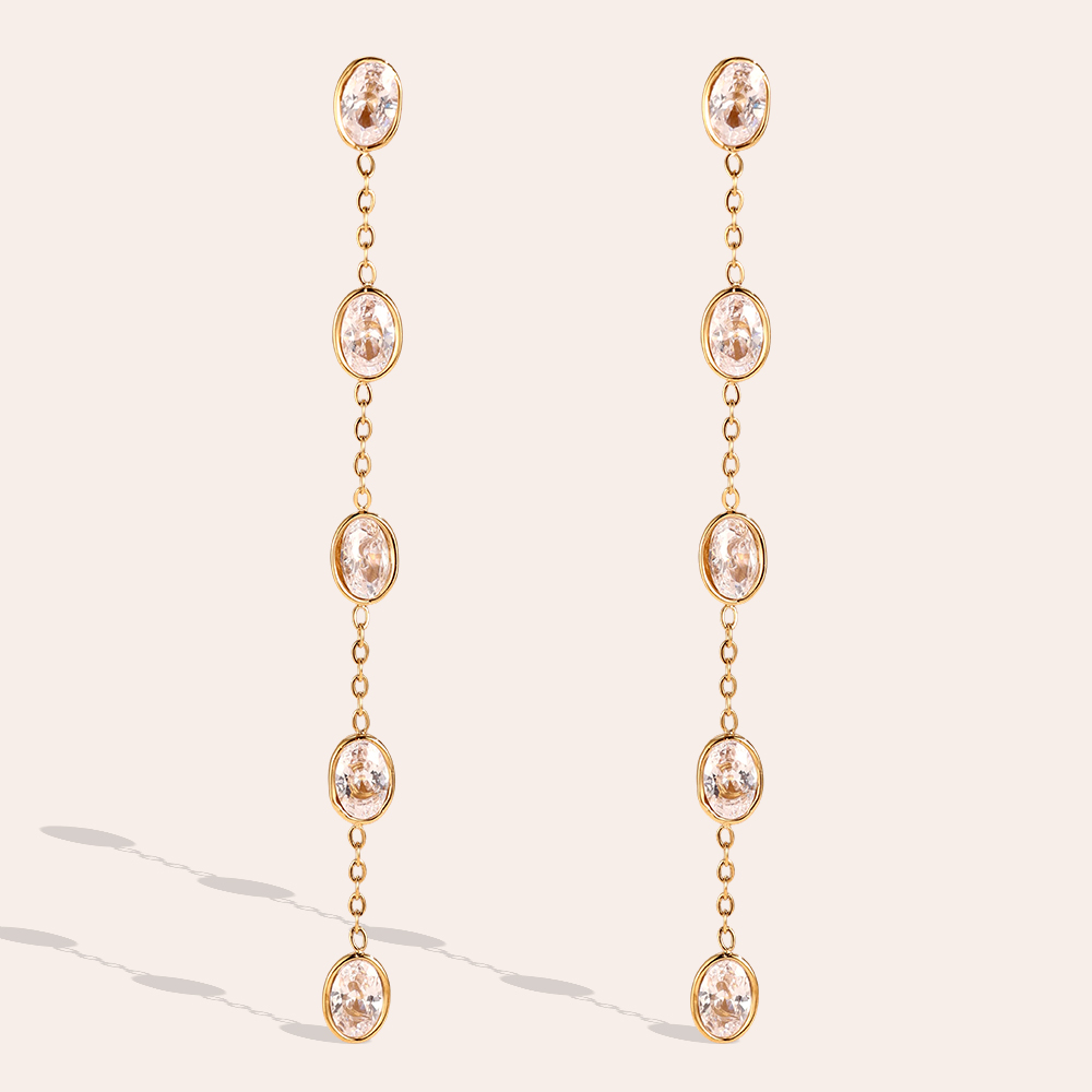 Stainless steel earrings, 7.4 × 5 mm, with lots of oval-shaped rhinestones