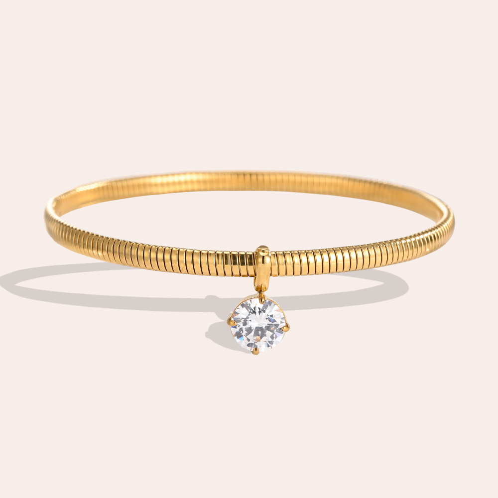 Stainless steel bangle, 6.2 cm, gold-coloured with round cubic zirconia