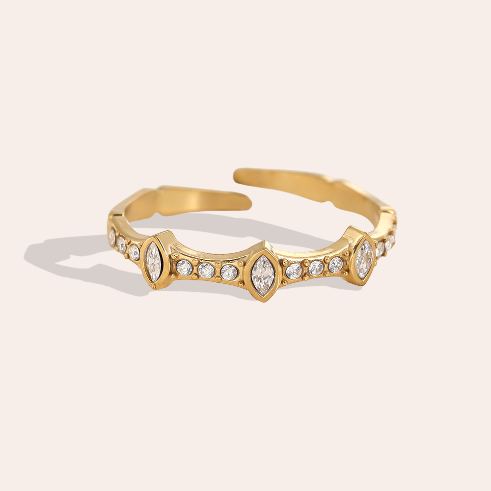 Stainless steel ring, adjustable, with a few cubic zirconia stones