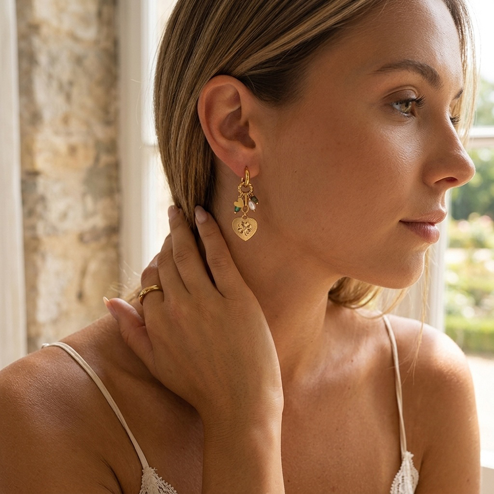 Stainless steel earrings, 46×17 mm, heart-shaped with a floral motif