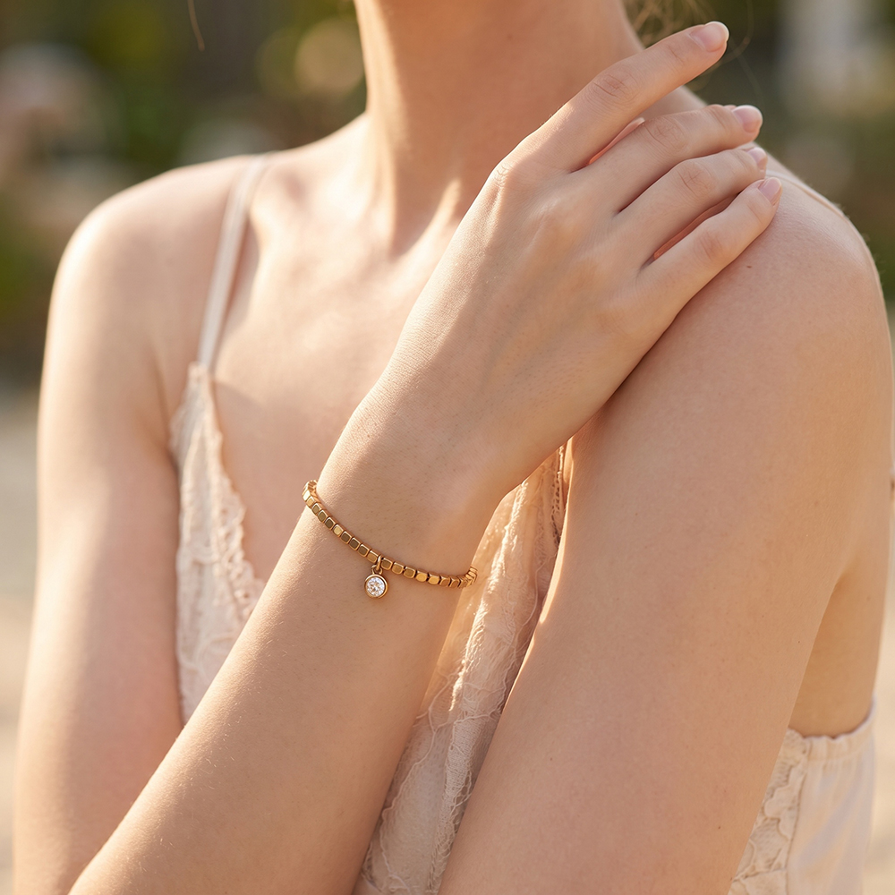 Stainless steel elastic bracelet with small squares and cubic zirconia  