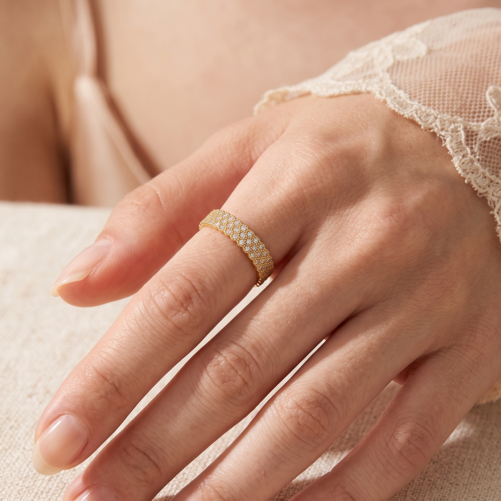 Stainless steel ring, adjustable, set with many small, sparkling cubic zirconia stones