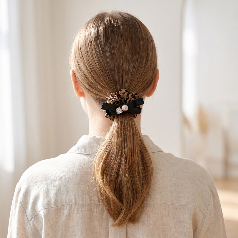 Leopard-print scrunchie with a bow    