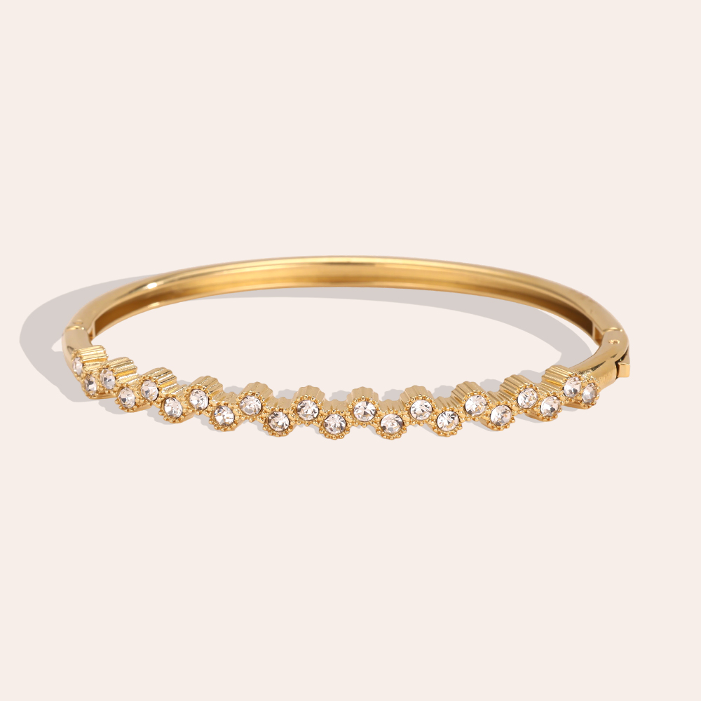 Stainless steel bangle, 6 cm, featuring many elegant, sparkling cubic zirconia stones  