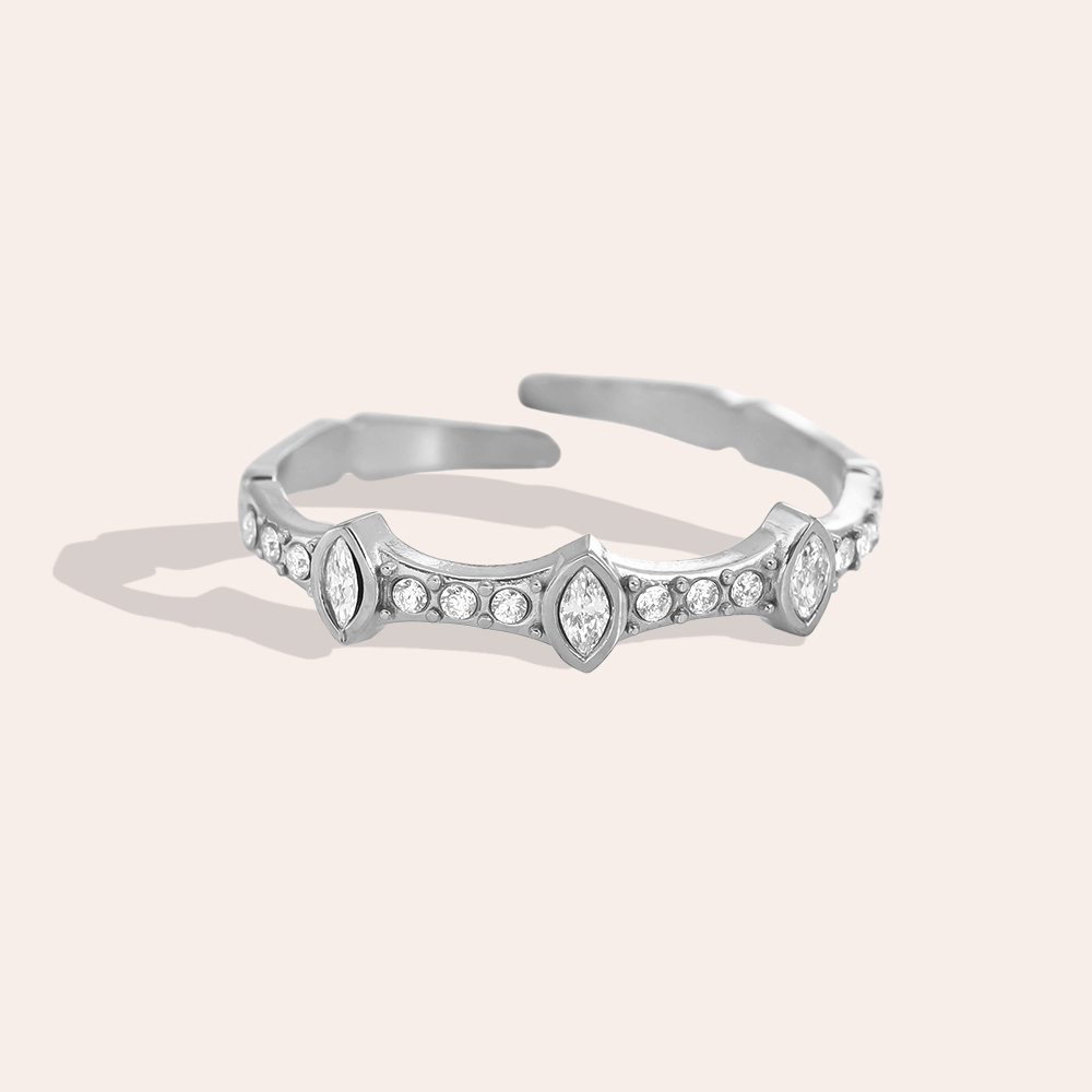 Stainless steel ring, adjustable, with a few cubic zirconia stones