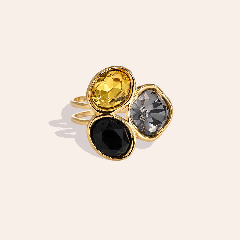 Stainless steel ring, adjustable, with three glass stones in different colours 