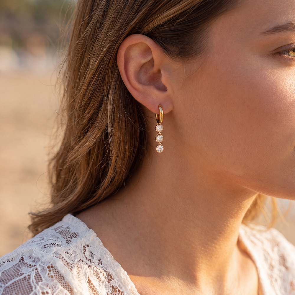 Stainless steel earrings, 40 × 6 mm, with 3 round rhinestones 