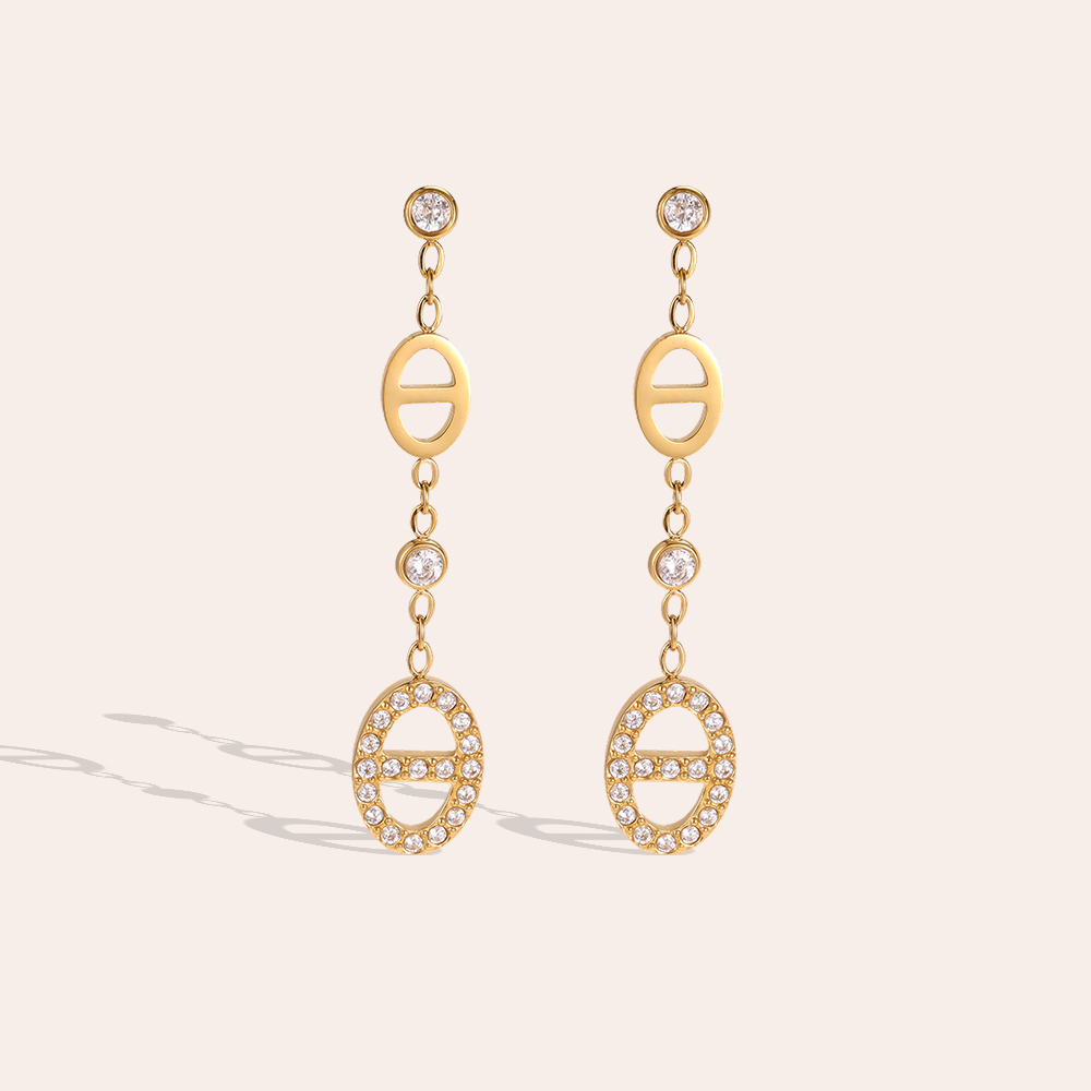 Stainless steel earrings, 37 × 7 mm, oval-shaped cubic zirconia, left-hand pair 