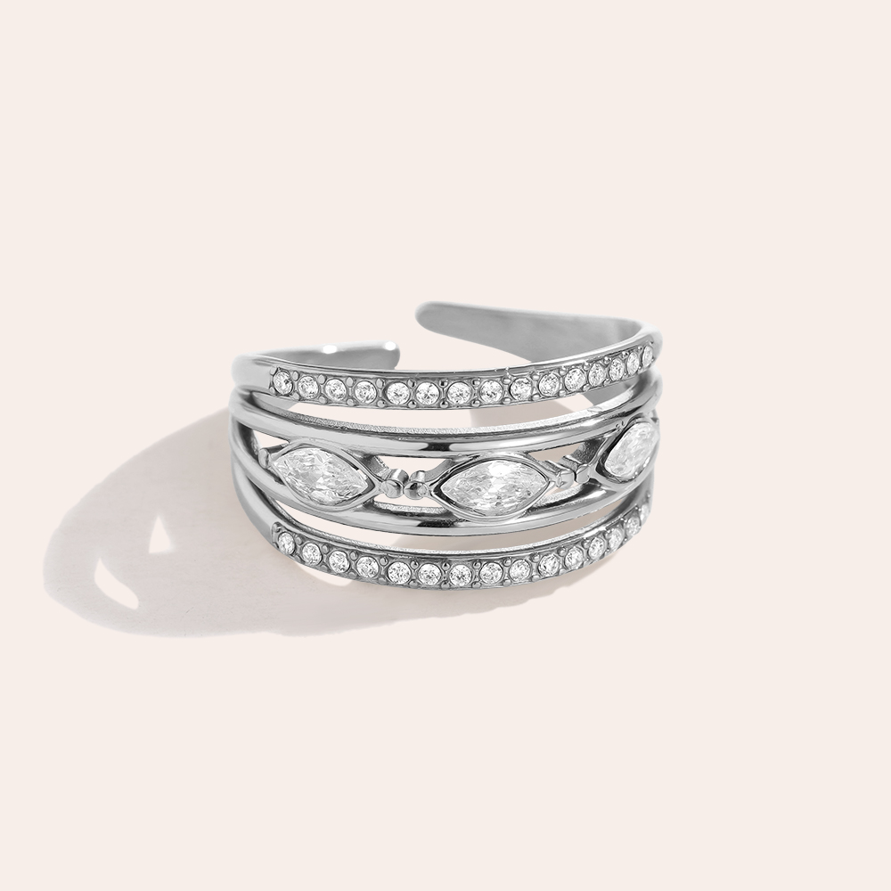 Stainless steel ring, adjustable, three-layered, with some cubic zirconia 