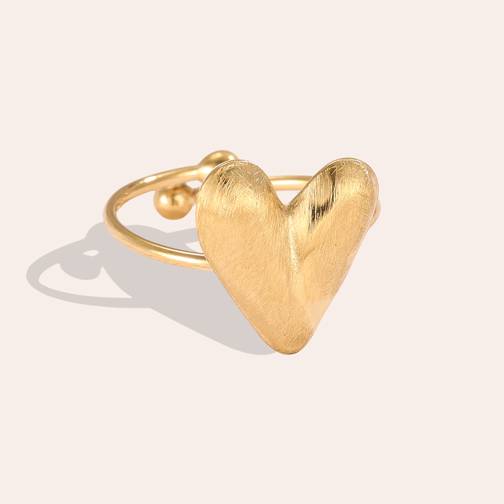 Stainless steel ring with adjustable matt heart
