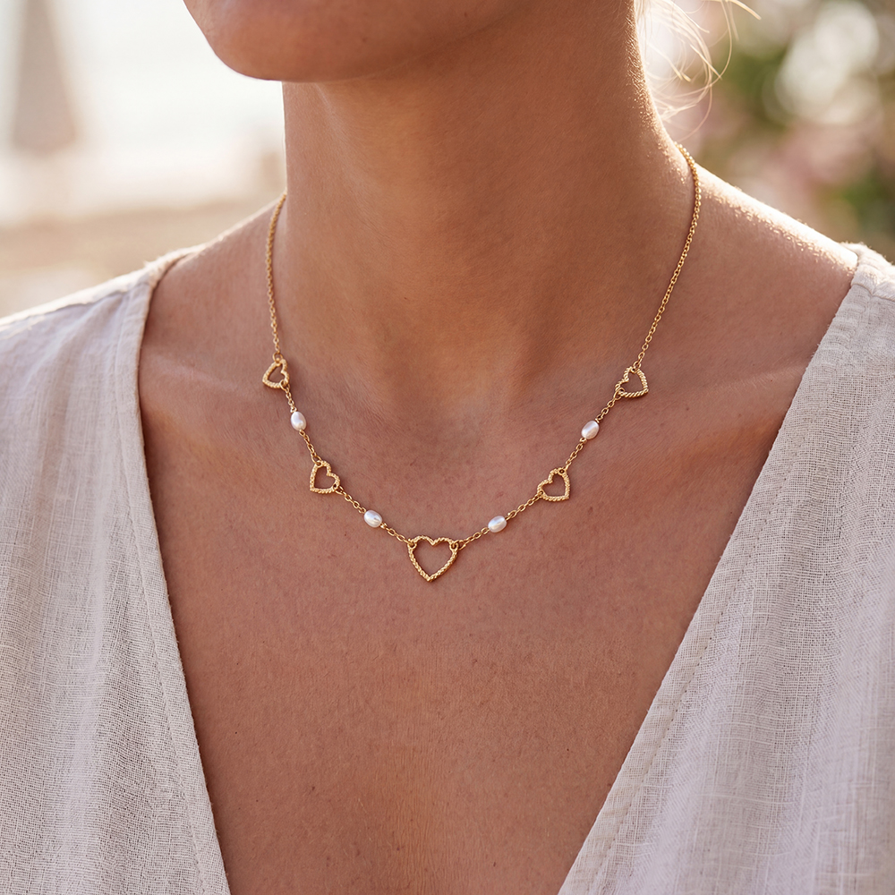 Stainless steel necklace, 42cm, with a pearl and a heart
