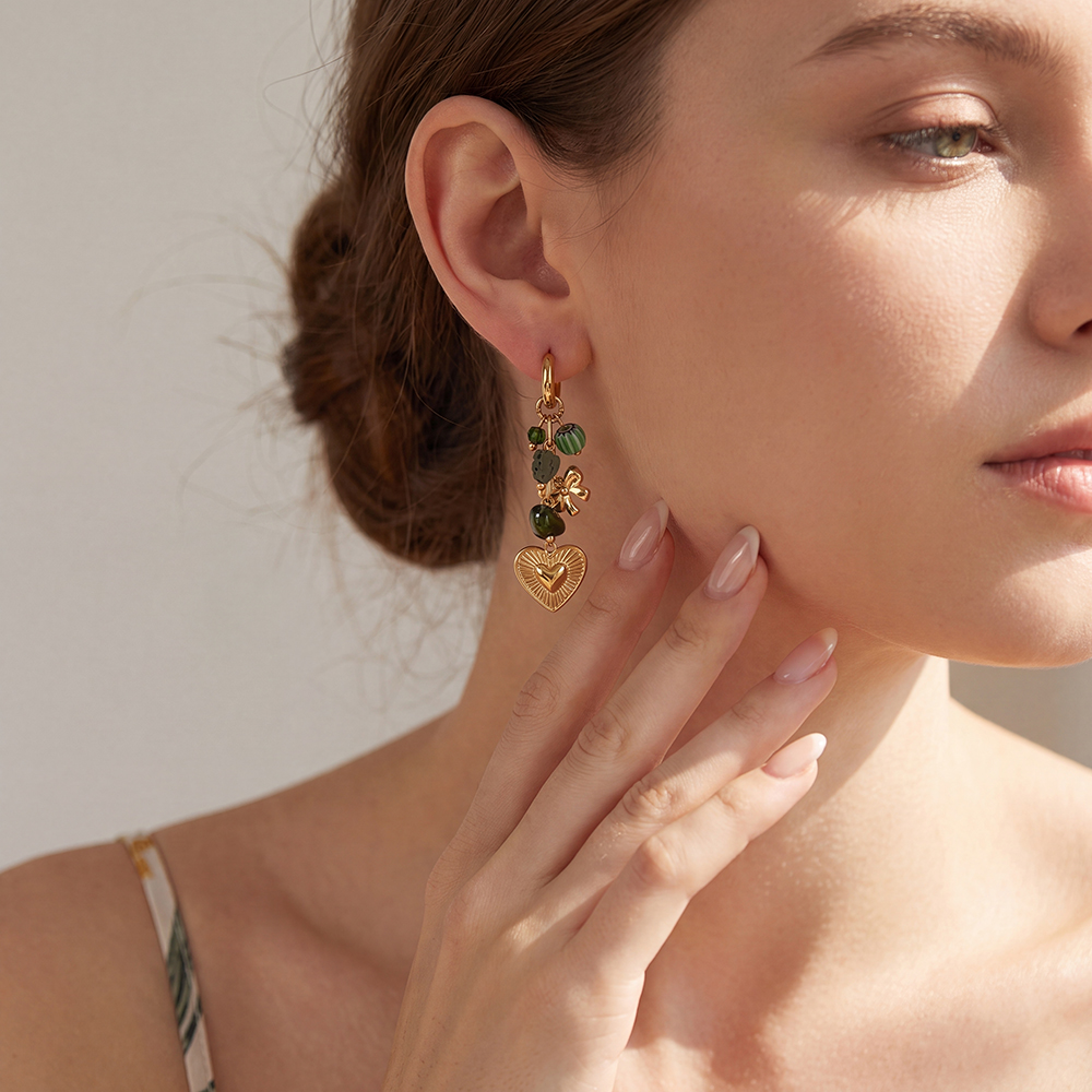 Stainless steel earrings, 55 × 16 mm, with golden hearts and green embellishments